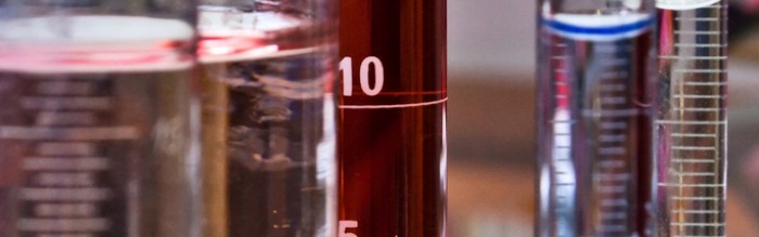 beakers with chemicals inside